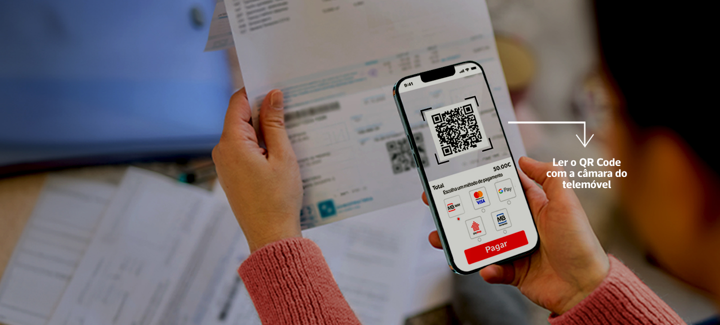 Senhora na app da POP a fazer um pagamento e onde se lê 