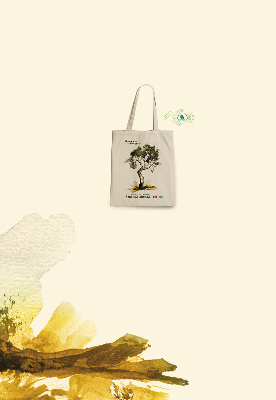 Saco bege com ilustração de uma árvore com o texto “Ofereci umá árvore à nossa floresta”.
